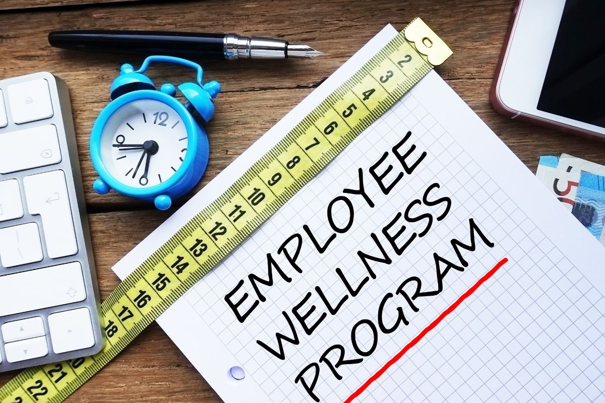 Employee wellness program written on a paper for creating a small competion