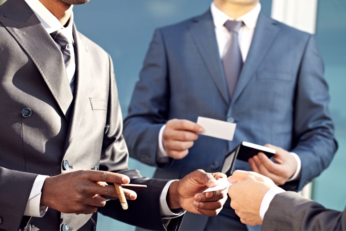 Men exchanging business cards