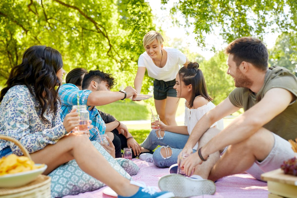 Office employees celebrating picnic together.