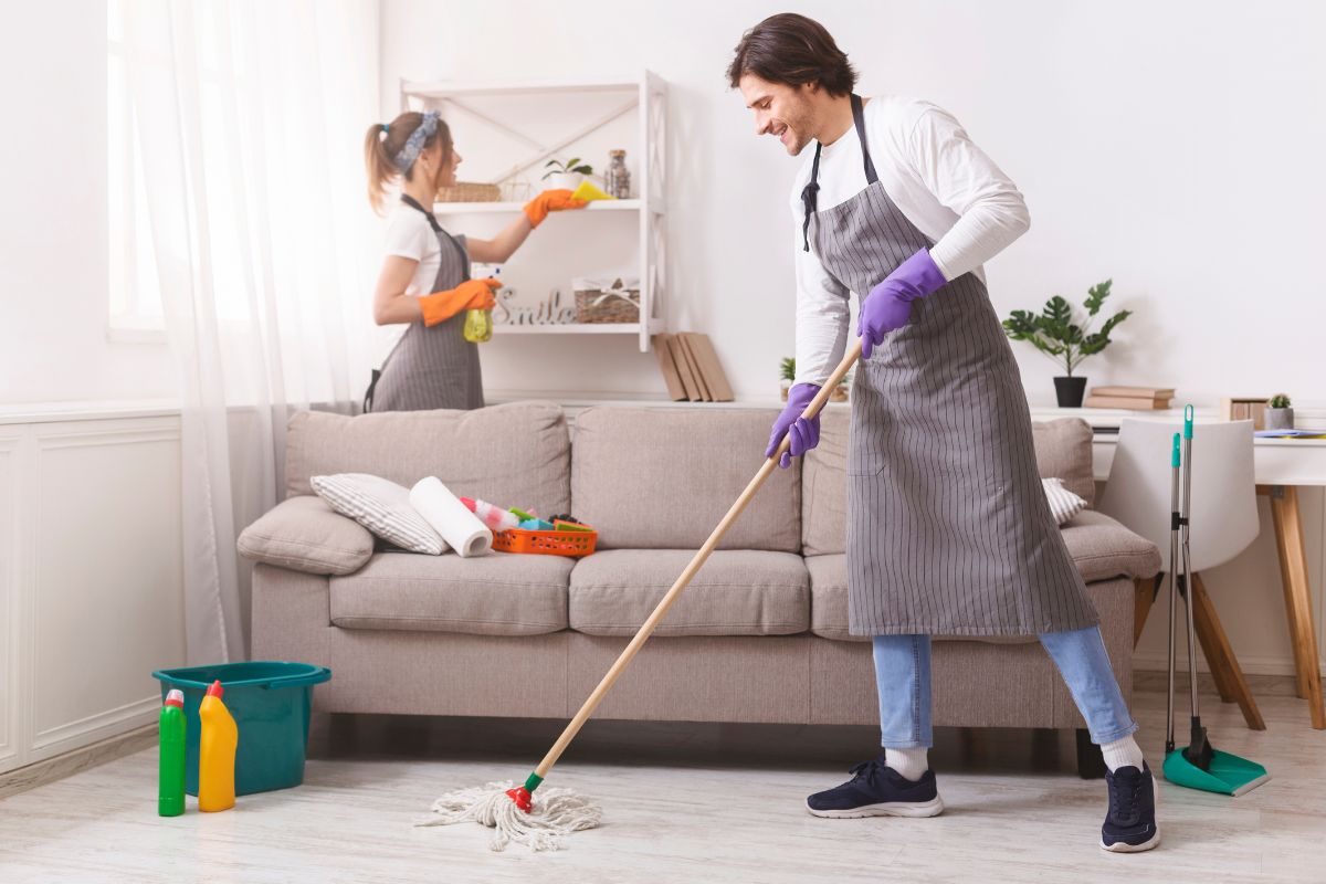 A man and woman offer home based cleaning services running their own business