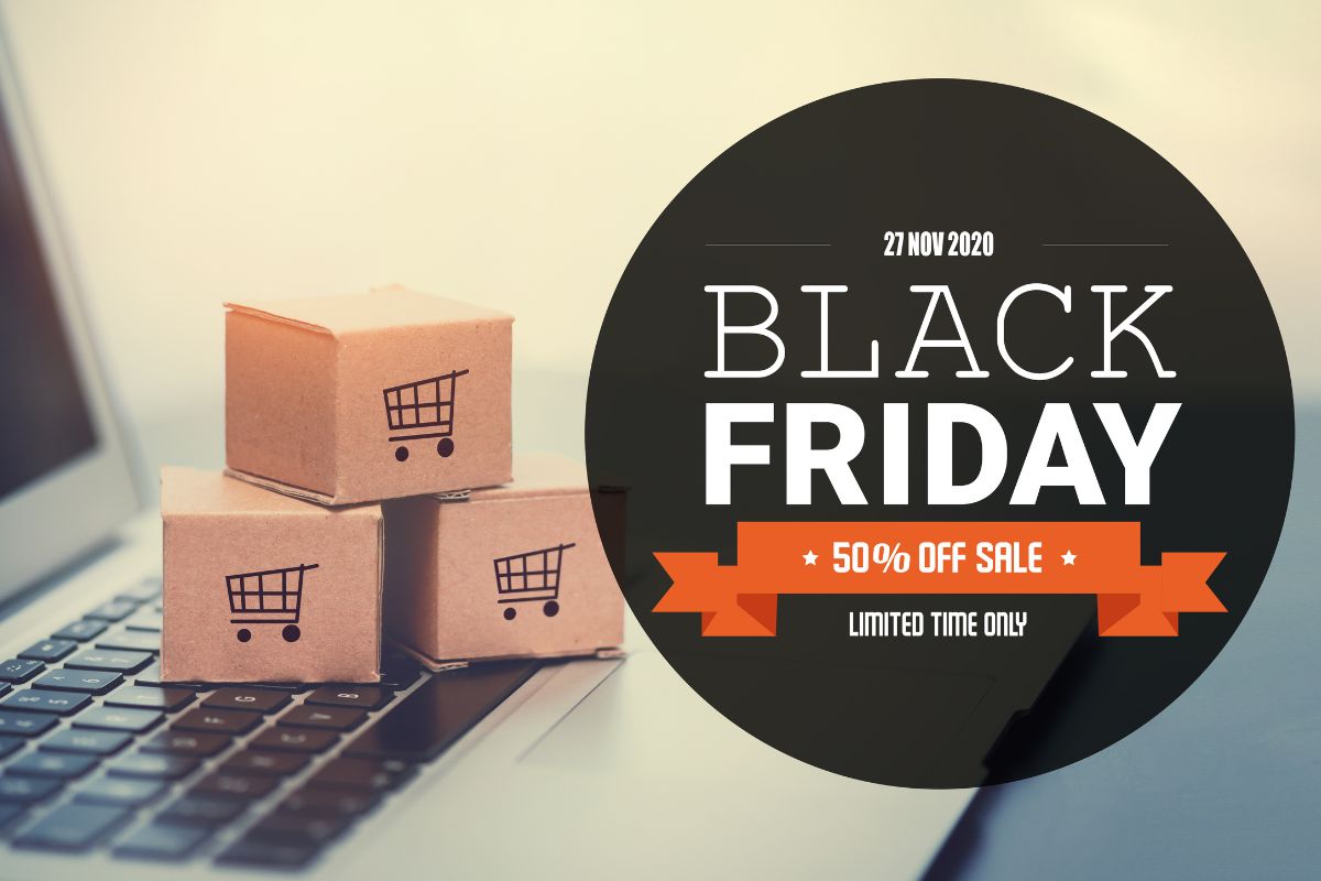 Displaying Black Friday sale offers as part of holiday e commerce calendar strategy alongside laptop