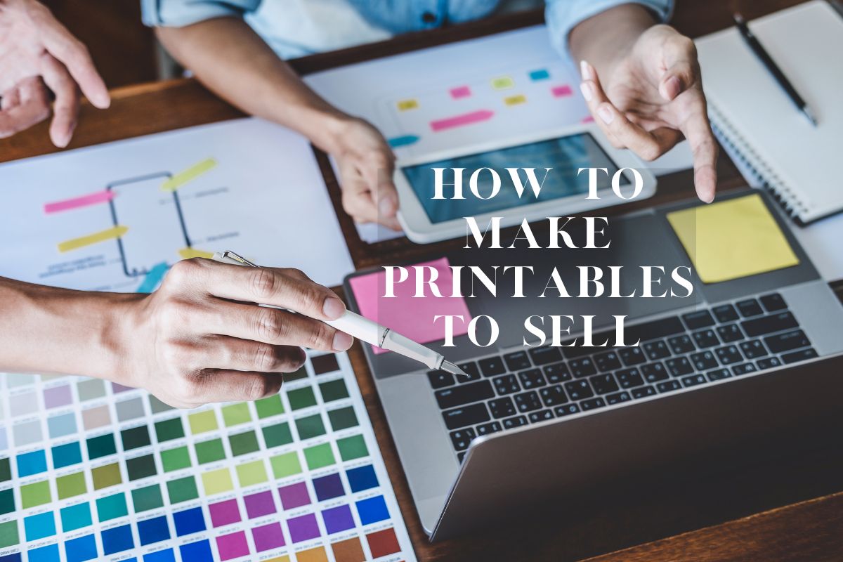 Laptop and color palettes on a table with a word how to make printables to sell
