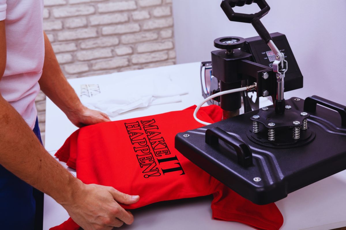 A man is printing crew neck red t shirt