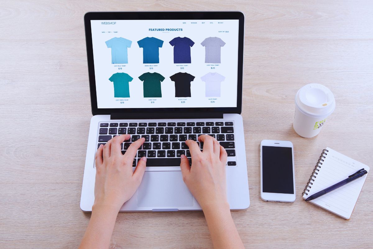A man shopping burnout t- shirts online