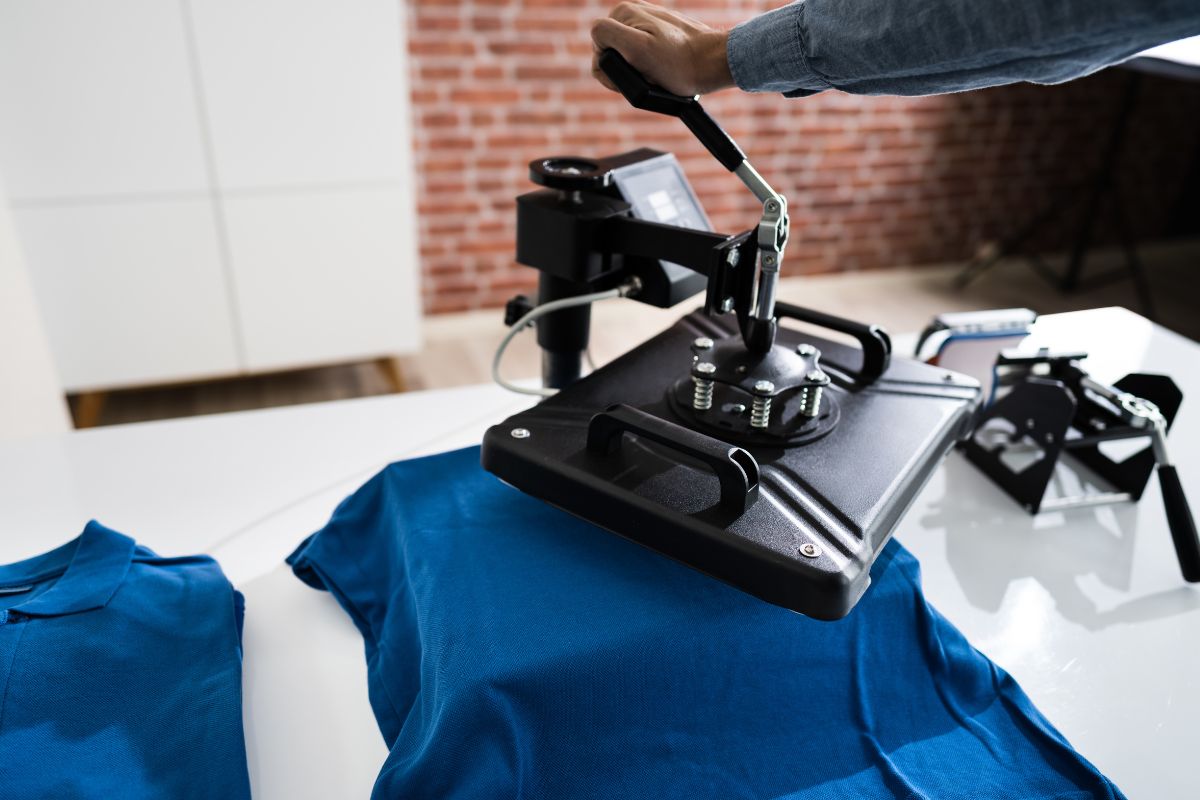 A shirt is being printed under a garment printing machine