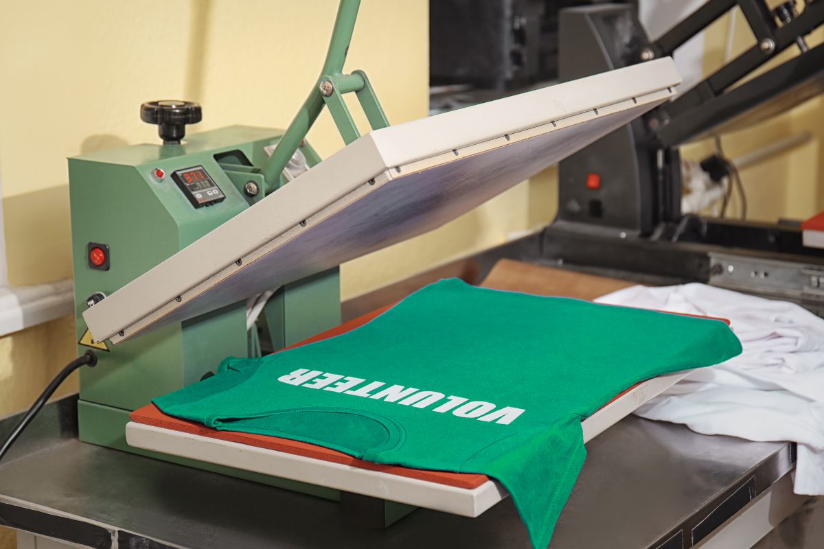 A t shirt being printed under screen printing machine an ecofriendly option
