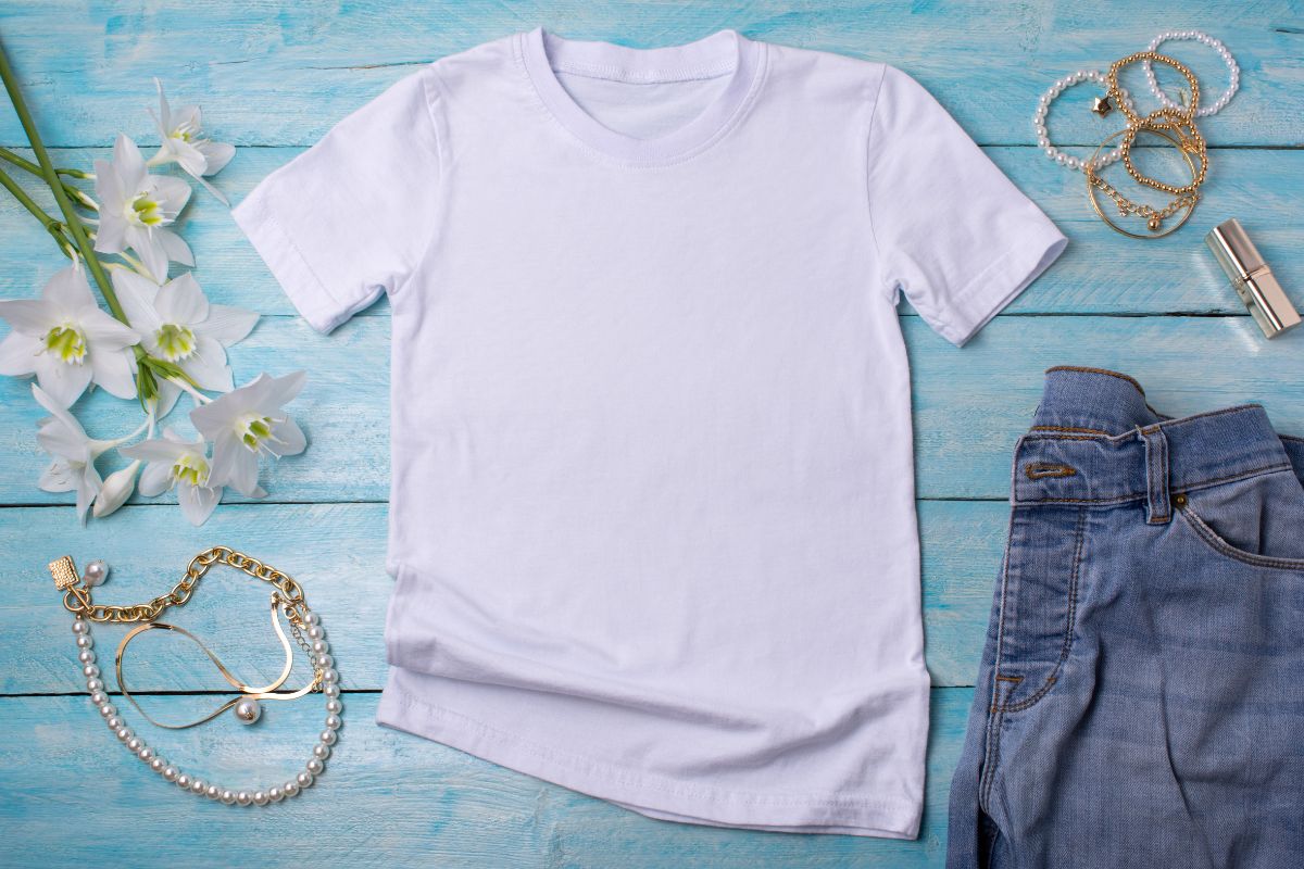 A t shirt kept with other wearable accessories
