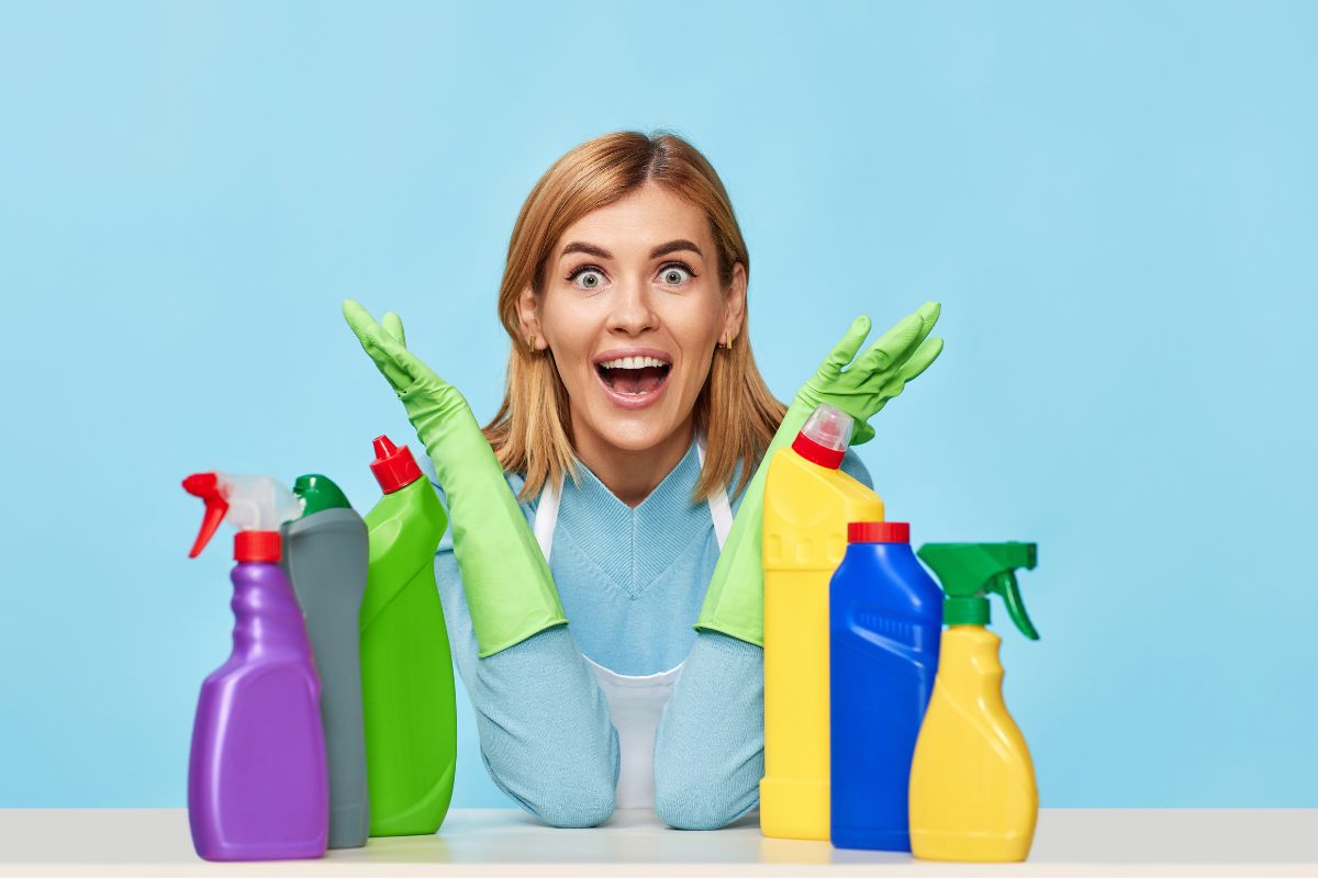 A woman is using mild cleaning agents alongside her cleaning routine