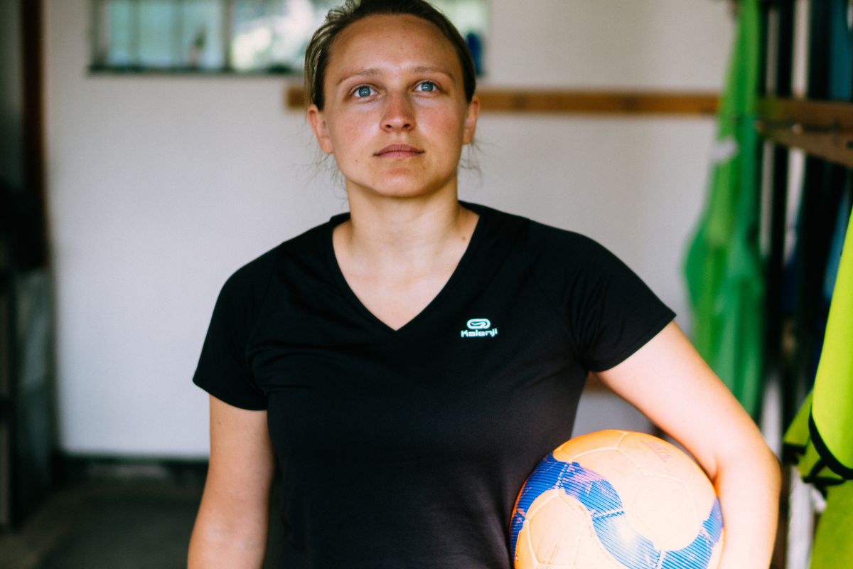 A woman wearing V Neck T shirt