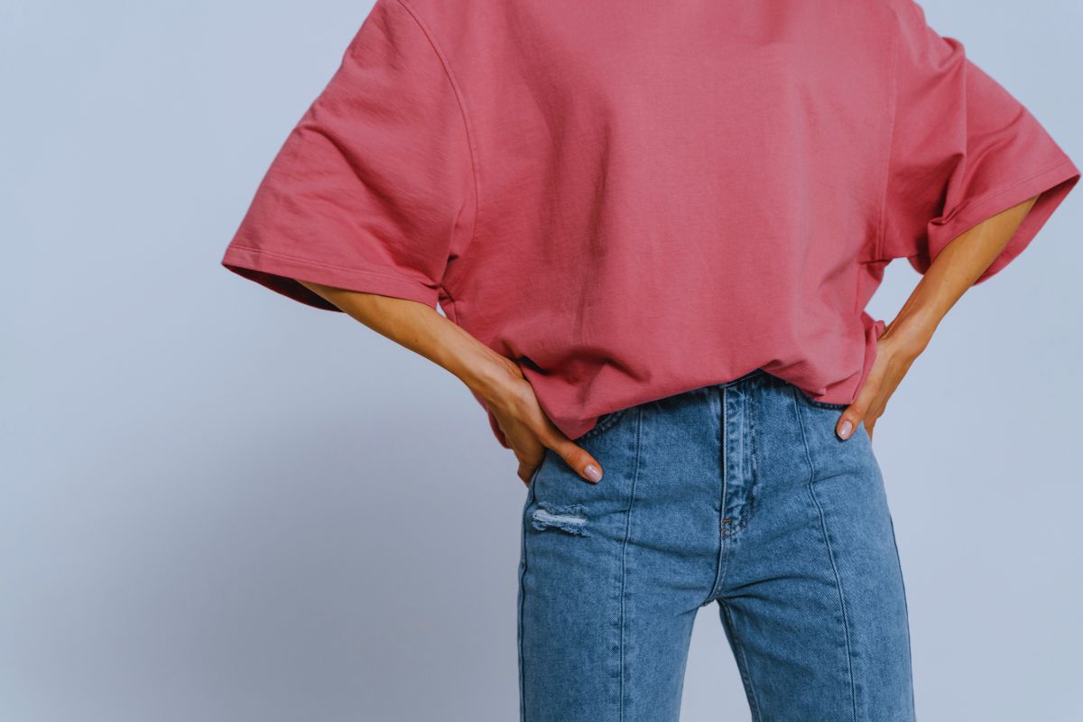 A woman wearing onion colour Boxy Fit T Shirt