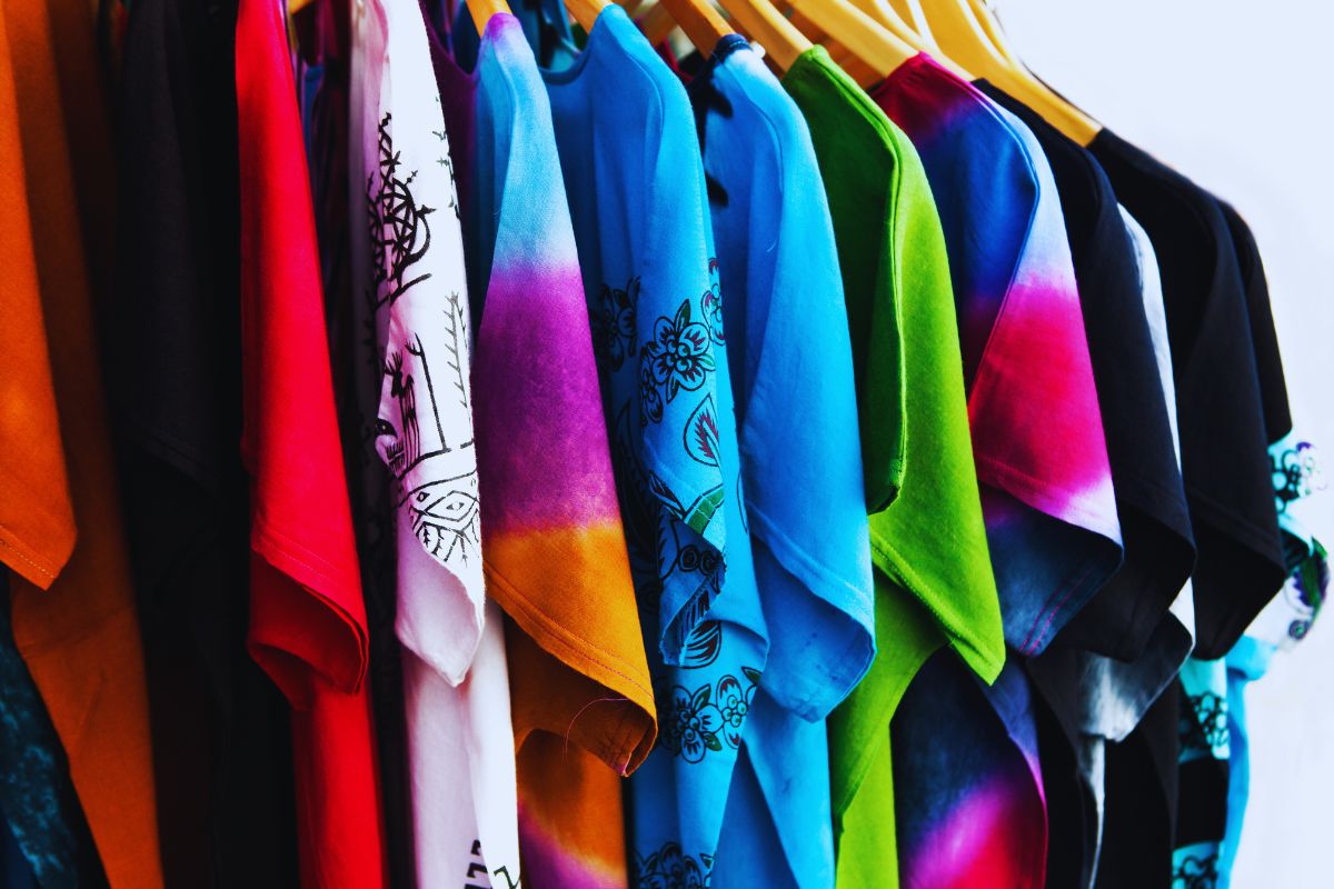 Colourful burnout t-shirts hanging on the hangers