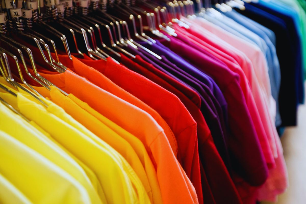 colourful crew neck t shirts hanging on hangers