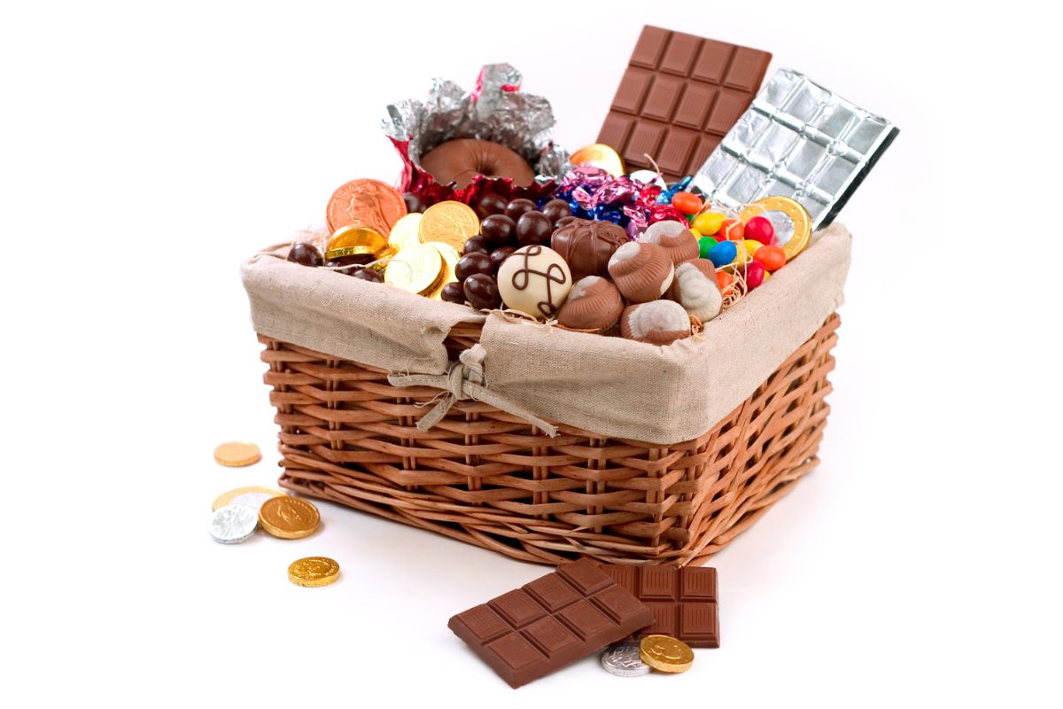 A gift basket for the nurses full of different kind of chocolates and snacks