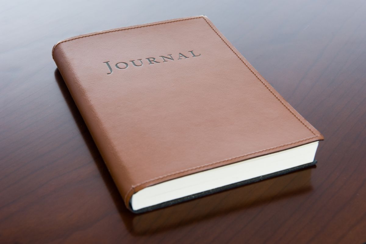 A leather journal gift for the employee.