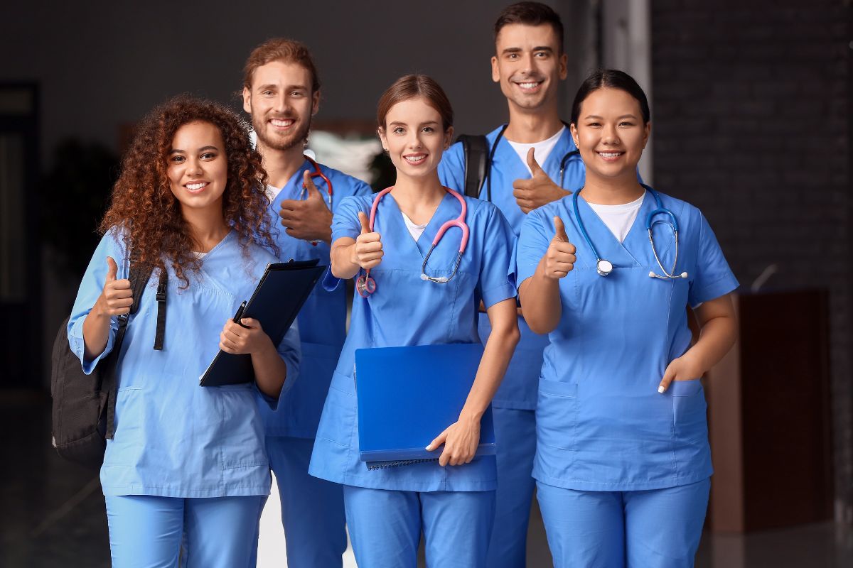 A staff of nurses celebrating milestone with each other