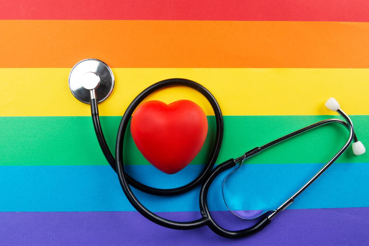 A stethoscope and a pride month flag