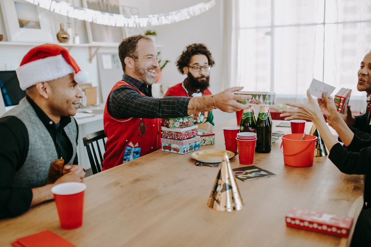 Office employees playing secret santa game with each other