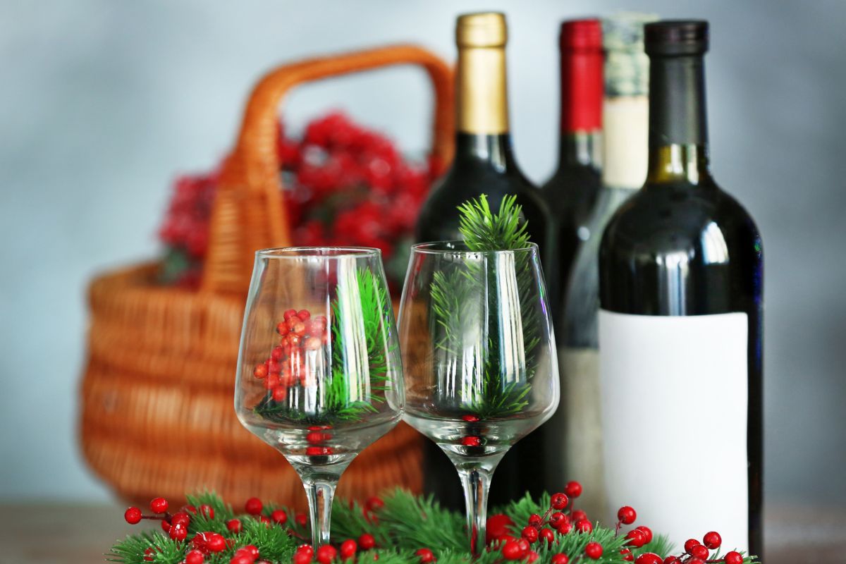 Wine bottles with two glasses and other deccorative items for christmas holidays