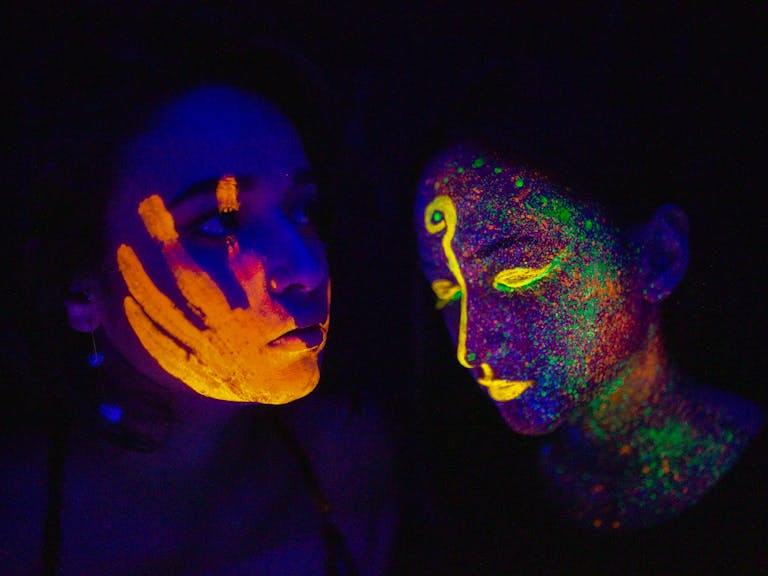 Glow in the Dark Paint on Women's Faces