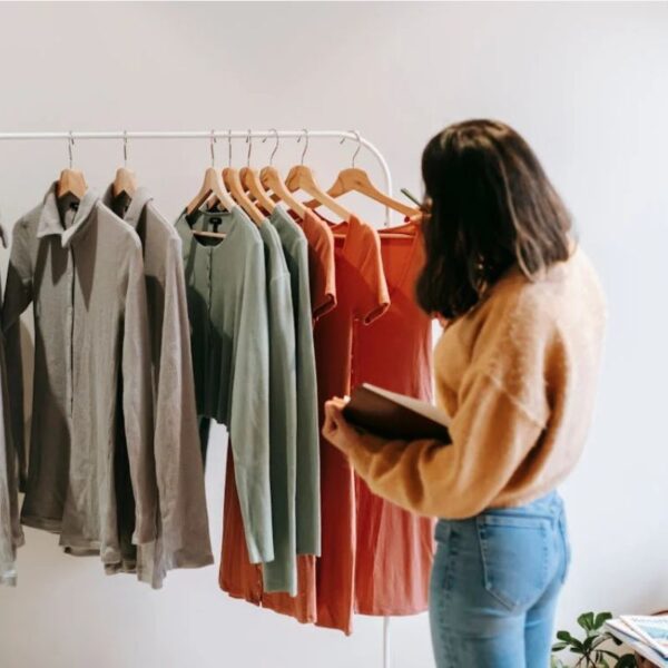 A lady learning how to design clothes.