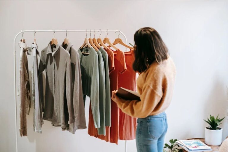 A lady learning how to design clothes.