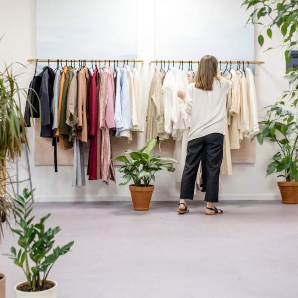 A lady learning what is merchandising at a merchandise store.