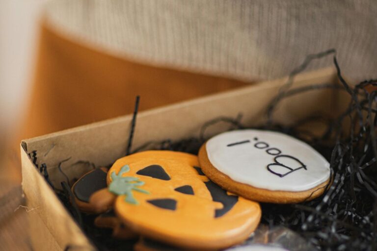 A lady packing halloween gifts.