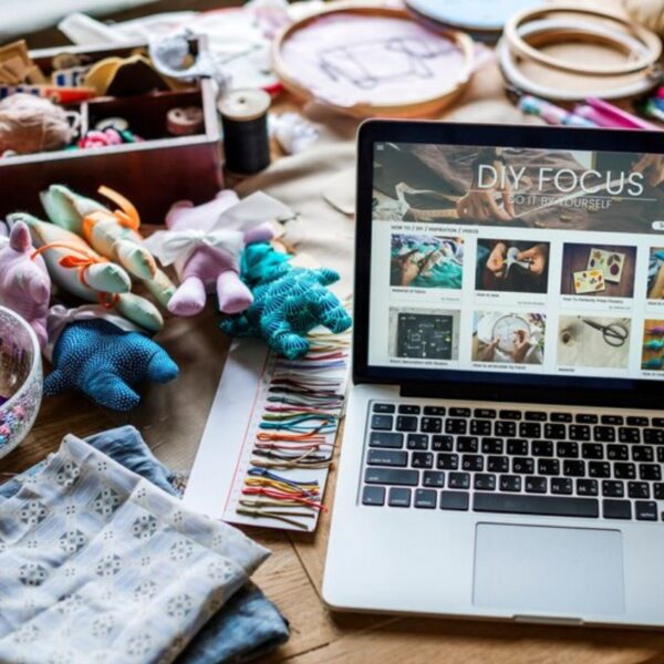 A lady setting up her website for etsy shop.