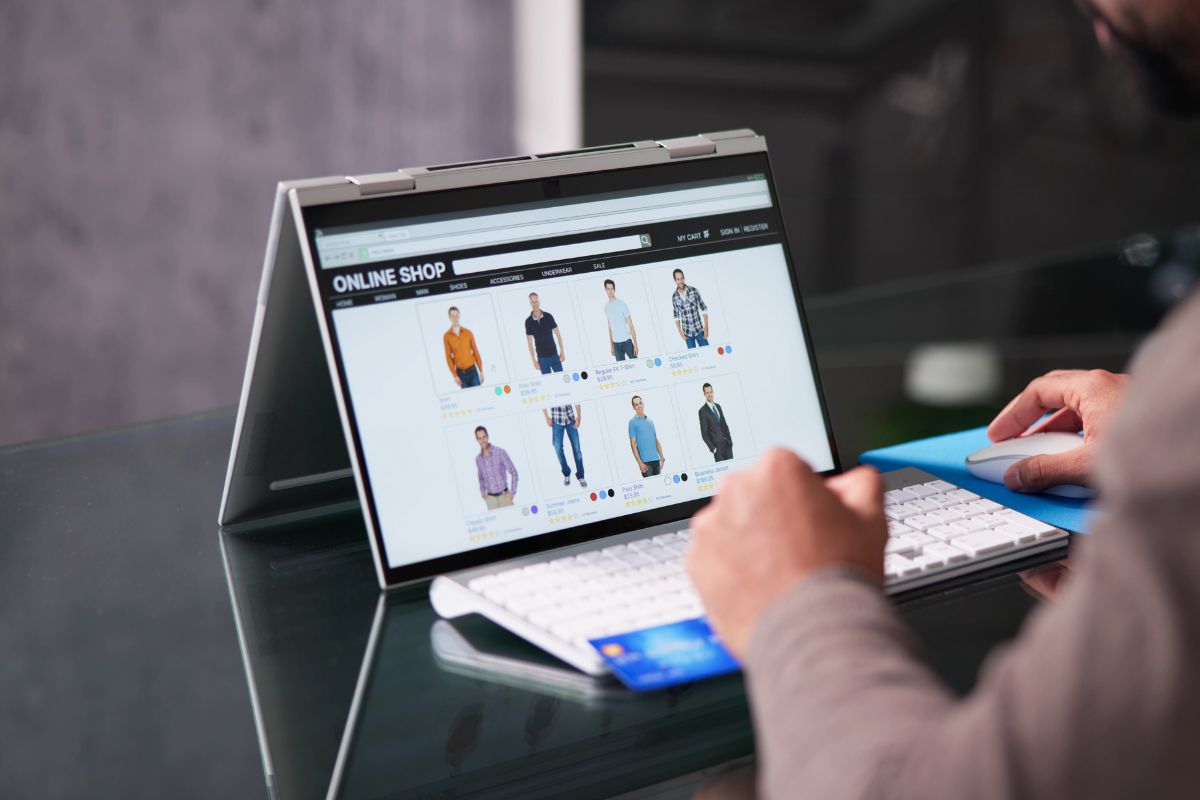 A person buying apparel online from a custom website.