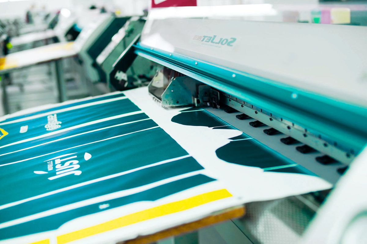 A sublimation printer printing on a fabric.