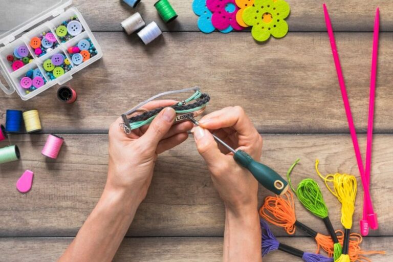 A person making custom wristband and personalizing it.