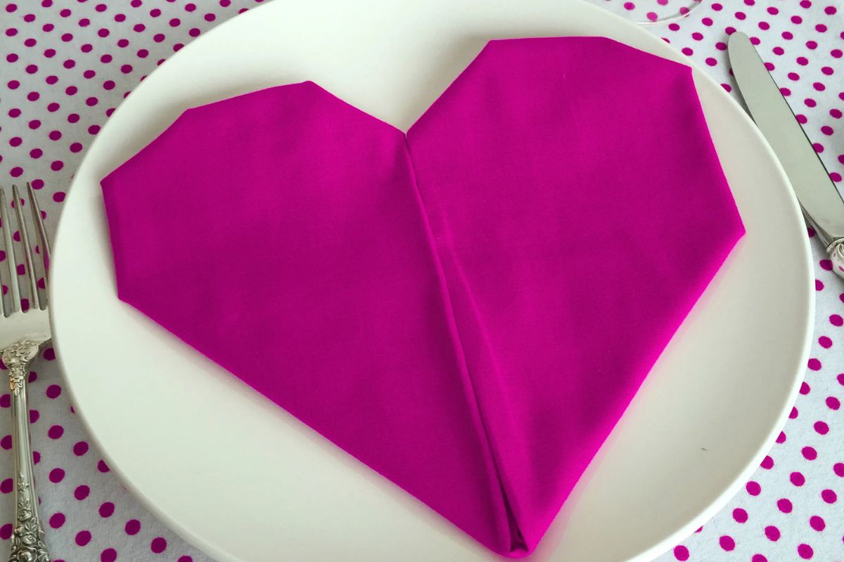 The heart fold napkin design shown in the image