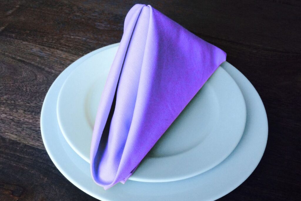 The pyramid fold design napkin shown in the image