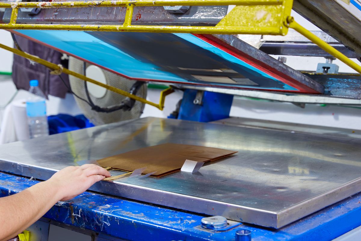 A machine printing on a bag