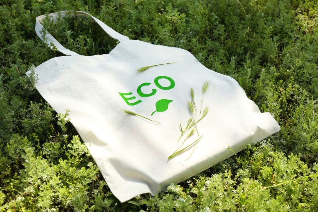 An eco friendly custom bag kept on a grass surface